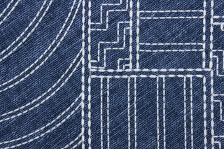  Kathu is an embroidered fabric featuring a geometrical design in midnight blue and white.  It is stable and durable with 18,000 double rubs.  Uses include drapery, pillows, light upholstery, table runners, bedding, headboards, home décor and apparel. 
