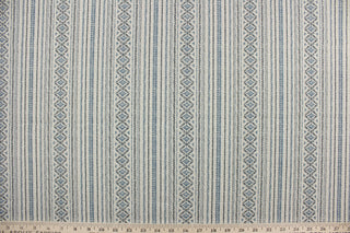 Bindu is a multi purpose fabric featuring a striped Aztec design.  The versatile fabric is perfect for window accents (draperies, valances, curtains and swags) cornice boards, accent pillows, bedding, headboards, cushions, ottomans, slipcovers and upholstery.  It has a soft workable feel yet is stable and durable.  Colors included are navy blue, charcoal gray and stone.