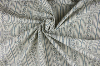 Bindu is a multi purpose fabric featuring a striped Aztec design.  The versatile fabric is perfect for window accents (draperies, valances, curtains and swags) cornice boards, accent pillows, bedding, headboards, cushions, ottomans, slipcovers and upholstery.  It has a soft workable feel yet is stable and durable.  Colors included are navy blue, charcoal gray and stone.