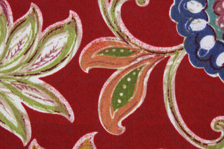 This fabric features a large floral design and is perfect for any project where the fabric will be exposed to the weather.  Able to resist stains and water, and has a rating of 10,000 double rubs, UV tested and can withstand 500 hours of direct sunlight.  Uses include cushions, tablecloths, upholstery projects, decorative pillows and craft projects. This fabric has a slightly stiff feel but is easy to work with.  Colors included are navy blue, olive green, red, berry pink, gold and white.