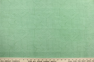 This Solarium outdoor decorative print features a geometric design in green.  This versatile, long-lasting fabric can withstand up to 500 hours of sunlight, water and stain resistant and has 10,000 double rubs.  It is perfect for lounge cushions, pool furniture, tablecloths, decorative pillows and upholstery projects.  This fabric has a slightly stiff feel but is easy to work with.  