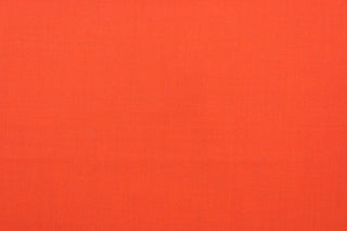 This beautiful solid orange fabric has a smooth and lustrous appearance.  The  fabric offers a crisp hand and a stiff but flexible drape.  The glossy finish makes it great for apparel, drapery lining and much more.   