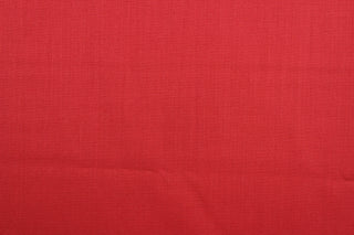  This beautiful solid red fabric has a smooth and lustrous appearance.  The  fabric offers a crisp hand and a stiff but flexible drape.  The glossy finish makes it great for apparel, drapery lining and much more.   
