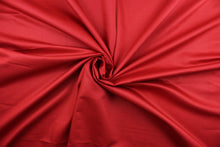 Load image into Gallery viewer, This beautiful solid red fabric has a smooth and lustrous appearance.  The  fabric offers a crisp hand and a stiff but flexible drape.  The glossy finish makes it great for apparel, drapery lining and much more.   
