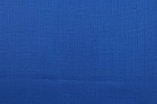This beautiful solid blue fabric has a smooth and lustrous appearance.  The  fabric offers a crisp hand and a stiff but flexible drape.  The glossy finish makes it great for apparel, drapery lining and much more.   