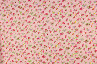 This beautiful rose and leaves print in  purple, deep pink, green, and yellow against  a pink with white polka dot background is a great fabric for quilting, bedding, clothing, pin cushions, crafting and home décor, etc.