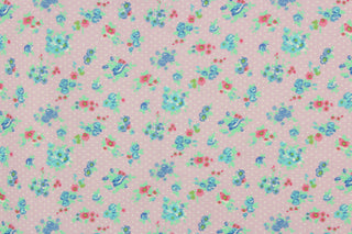 This beautiful rose and leaves print in  blue, pink and green against  a light purple polka dot background is a great fabric for quilting, bedding, clothing, pin cushions, crafting and home décor, etc. 