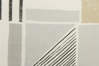 This fabric features a unique design in beige, gray, black and dull white .
