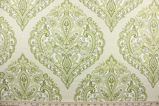 Arabella is a multi use fabric featuring a damask floral design in shades of green and ivory against a cream background.  The versatile fabric is perfect for window accents (draperies, valances, curtains and swags) cornice boards, accent pillows, bedding, headboards, cushions, ottomans, slipcovers and upholstery.  It has a soft workable feel yet is stable and durable.