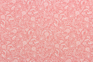 This fabric features tiny wispy flowers in white on a coral background. The versatile lightweight fabric is soft and easy to sew.  It would be great for quilting, crafting and sewing projects.  