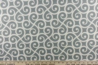 This fabric feature a delightful design of swirled lines that touch sides in white on a gray background. 
