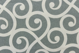This fabric feature a delightful design of swirled lines that touch sides in white on a gray background. 