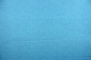  An outdoor fabric in a beautiful solid blue with hints of dark blue.  Use this for outdoor upholstery, cushions, pillows, etc.  This fabric can withstand 500 hours of sunlight and is stain and water resistant.  To maintain the life of the fabric we suggest bring it indoors when not using.  We offer this design in several different colors. 