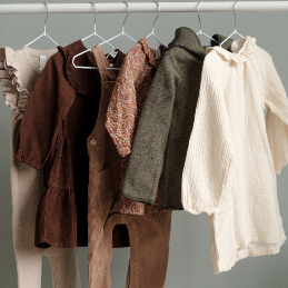 Clothing rack showing our Apparel Collection 