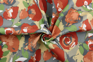 This Solarium outdoor decorative print features a large watercolor floral design in green, gray, white, tan and orange.  