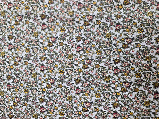 Timeless Treasures Crowded Floral Quilting Fabric in Yellow Buds