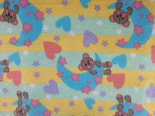 Stars, Moon and Hearts Polar Fleece Fabric in Multi