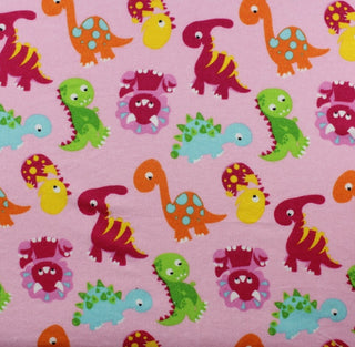 Baby Jurassic Flannel Fabric in Pink 
