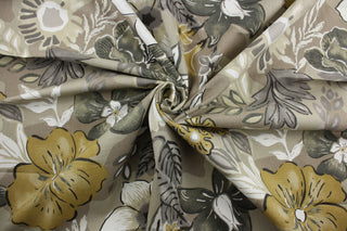  Robert Allen© Bahenga in Twine features a stunning large-scale floral print with a taupe, brown, gray, white and dark gold color palette. Constructed with 100,000 double rubs, this multi-purpose fabric is ideal for a variety of projects.  It can be used for several different statement projects including window accents (drapery, curtains and swags), toss pillows, headboards, bed skirts, duvet covers, upholstery, and more.