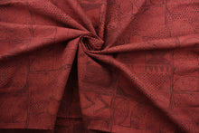 Load image into Gallery viewer,  Robert Allen© Cassava in Cinnabar is a stylish multi-purpose fabric featuring a unique geometrical print in reddish-brown hues.  It has been engineered with a soil and stain repellant finish and is highly durable, with a fabric rating of 100,000 double rubs.  It can be used for several different statement projects including window accents (drapery, curtains and swags), toss pillows, headboards, bed skirts, duvet covers, upholstery, and more.
