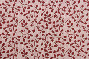 The Robert Allen Berk in Rose is an upholstery fabric made with a polyester blend.  This fabric has an intricate floral design with shades of pink, red, and beige.  It is ideal for a variety of projects, such as sofas, chairs, dining chairs, pillows, handbags, and other craft projects.