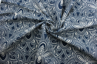 Robert Allen© Damod in Indigo is an outdoor fabric. Its floral print in indigo blue and ivory adds a modern touch, while its water, soil and stain repellant composition ensures long lasting quality and a lasting vibrant look. Perfect for patio, deck and poolside.  It can be used for several different statement projects including cushions, upholstery projects and decorative pillows. 