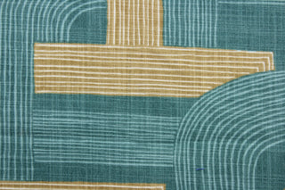 Robert Allen© Contour Lines in Jasper is a multi-purpose fabric featuring a geometrical print in tan and teal. Its soil and stain repellant finish provides enhanced durability with 65,000 double rubs. It can be used for several different statement projects including window accents (drapery, curtains and swags), toss pillows, headboards, bed skirts, duvet covers, upholstery, and more.