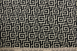 The Robert Allen© Square Maze in Ink adds a contemporary yet timeless touch to any space.  Boasting a stylish geometric print in a light beige and black, this fabric is designed with 15,000 double rubs and features a soil and stain repellant finish.  It can be used for several different statement projects including window accents (drapery, curtains and swags), toss pillows, headboards, bed skirts, duvet covers, upholstery, and more.