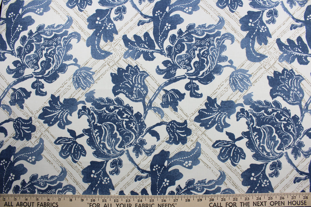 The Robert Allen© Bluebonnet in Indigo features a unique, multipurpose print with geometric and floral motifs that come together in a distinctive indigo blue, gold, and white color palette. It's designed to withstand up to 100,000 double rubs, and is dirt and stain repellant for worry-free use. It can be used for several different statement projects including window accents (drapery, curtains and swags), toss pillows, headboards, bed skirts, duvet covers, upholstery, and more.