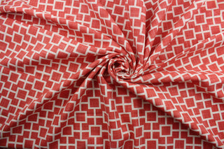 Make your project stand out with the Robert Allen© Cat's Cradle in Papaya. This linen blend fabric features a bold geometric print in papaya and ivory, providing a striking yet subtle look. With a 30,000 double rubs rating, it's designed to be durable and long-lasting. The soil and stain repellant finish ensures easy cleaning.  It can be used for several different statement projects including window accents (drapery, curtains and swags), toss pillows, headboards, bed skirts, duvet covers, and more.