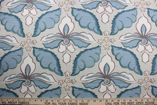  a large floral print with soft colors of plum, blue, white and yellow, this multipurpose fabric features a light taupe background for lasting appeal. Certified with 30,000 double rubs and treated with a soil and stain repellant finish, this fabric is perfect for bringing your interior design ideas to life.  It can be used for several different statement projects including window accents (drapery, curtains and swags), toss pillows, headboards, bed skirts, duvet covers, upholstery, and more.