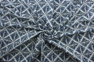 The Robert Allen© Gem Field in Birch is a multi-purpose fabric made with a geometric medallion print in indigo and off white.  It has a durable construction with 100,000 double rubs and is soil and stain resistant.  It can be used for several different statement projects including window accents (drapery, curtains and swags), toss pillows, headboards, bed skirts, duvet covers, upholstery, and more.