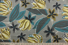 Load image into Gallery viewer, The exciting floral print features a palette of yellow, dark gold, teal, black and white on a grey background.  The multi-purpose fabric is soil and stain resistant and has been tested to withstand up to 65,000 double rubs for added durability.  It can be used for several different statement projects including window accents (drapery, curtains and swags), toss pillows, headboards, bed skirts, duvet covers and upholstery. 
