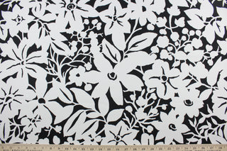  The Robert Allen© Floral Silhouette in Black offers a timeless yet modern design featuring a large flower print in classic black and white.  Made for multi-purpose use, the fabric is also treated with a soil and stain repellant finish.  It can be used for several different statement projects including window accents (drapery, curtains and swags), toss pillows, headboards, bed skirts, duvet covers and upholstery. 