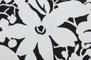  The Robert Allen© Floral Silhouette in Black offers a timeless yet modern design featuring a large flower print in classic black and white.  Made for multi-purpose use, the fabric is also treated with a soil and stain repellant finish.  It can be used for several different statement projects including window accents (drapery, curtains and swags), toss pillows, headboards, bed skirts, duvet covers and upholstery. 