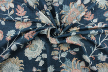 Load image into Gallery viewer, The Richloom© Bronte in Indigo brings an elegant touch to any space. This multipurpose fabric features a linen blend in floral prints with shades of blue, tan, white, and terracotta.  It can be used for several different statement projects including window accents (drapery, curtains and swags), toss pillows, headboards, bed skirts, duvet covers and light duty upholstery.  It has a soft workable feel yet is stable and durable with 12,000 double rubs. 
