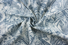 Load image into Gallery viewer,  Enjoy outdoor décor with Richloom Solarium© Wilshire in Indigo.  The fabric features a tranquil, tropical scene of foliage and birds perched on branches in vivid indigo and white tones.  This fabric is U/V fade and water/stain resistant.  Perfect for porches, patios and pool side.  Uses include toss pillows, cushions, upholstery, tote bags and more. 

