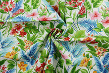 Load image into Gallery viewer, The Richloom Solarium© Cavena in Multi fabric combines a bright, tropical floral print in red, pink, blue, green, and yellow on a white background, resulting in a versatile fabric that&#39;s perfect for any project.  Its vibrant colors will bring a bold aesthetic to any space.  This fabric is U/V fade and water/stain resistant.  Perfect for porches, patios and pool side.  Uses include toss pillows, cushions, upholstery, tote bags and more. 
