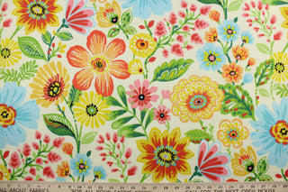 The Richloom© Gregoire in Chamomile is an eye-catching fabric featuring a vibrant floral print in a variety of colors, including red, green, pink, blue, mustard, white, green, orange, and yellow.  Ideal for drapery and decorative pillows, its bright pop of color is sure to make any room vibrant.