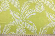 Load image into Gallery viewer, This Robert Allen© Pina fabric is the perfect addition to any home. The multipurpose linen blend adds an elegant texture, while its distinct pattern features white pineapples against a peridot background to add a natural beauty to any room. It can be used for several different statement projects including window accents (drapery, curtains and swags), toss pillows, headboards, bed skirts, duvet covers and light upholstery. 
