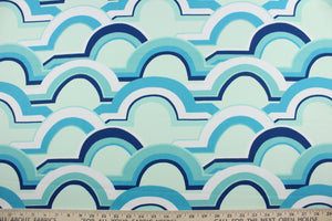 The Robert Allen© Eden Roo in Aqua is crafted with a geometric print, highlighted with beautiful colors including aqua, light mint green, white, and navy blue. Practical and stylish, it also has a soil and stain repellant finish to keep it looking vibrant.  It can be used for several different statement projects including window accents (drapery, curtains and swags), toss pillows, headboards, bed skirts, duvet covers and upholstery. 