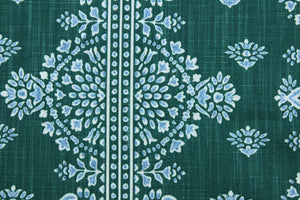 The Robert Allen© Alfama in Emerald features a multipurpose damask print, accented by blue and white on an emerald green background.  It is designed for long-lasting use, with 65,000 double rubs and soil and stain resistance.  It can be used for several different statement projects including window accents (drapery, curtains and swags), toss pillows, headboards, bed skirts, duvet covers, upholstery, and more.