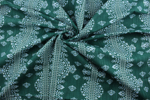 The Robert Allen© Alfama in Emerald features a multipurpose damask print, accented by blue and white on an emerald green background.  It is designed for long-lasting use, with 65,000 double rubs and soil and stain resistance.  It can be used for several different statement projects including window accents (drapery, curtains and swags), toss pillows, headboards, bed skirts, duvet covers, upholstery, and more.
