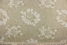 Load image into Gallery viewer,  The Waverly© Flower Spray in Oatmeal is a unique multi-purpose fabric featuring a batik floral design in oatmeal and cream colors.  It can be used for several different statement projects including window accents (drapery, curtains and swags), toss pillows, headboards, bed skirts, duvet covers and light upholstery. 
