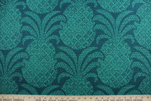 Load image into Gallery viewer, The Robert Allen© Colony Club in Marrakech Green features a large, multipurpose pineapple print on a dark blue green background.  It&#39;s made of durable fabric, boasting 30,000 double rubs that resists wear and tear.  It can be used for several different statement projects including window accents (drapery, curtains and swags), toss pillows, headboards, bed skirts, duvet covers and upholstery. 
