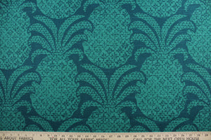 The Robert Allen© Colony Club in Marrakech Green features a large, multipurpose pineapple print on a dark blue green background.  It's made of durable fabric, boasting 30,000 double rubs that resists wear and tear.  It can be used for several different statement projects including window accents (drapery, curtains and swags), toss pillows, headboards, bed skirts, duvet covers and upholstery. 