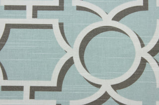 Robert Allen© Vreeland in Aquatint - a multi purpose geometric print featuring colors of aqua, brown, and white. This fabric not only looks great but is also incredibly durable with a rating of 30,000 double rubs.  It can be used for several different statement projects including window accents (drapery, curtains and swags), toss pillows, headboards, bed skirts, duvet covers and upholstery. 