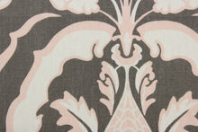 Load image into Gallery viewer,  The Robert Allen© Kathryn in Putty fabric is perfect for multipurpose projects. Constructed of a cotton blend, this damask print fabric features a pink, off white, and putty color palette.  It can be used for several different statement projects including window accents (drapery, curtains and swags), toss pillows, headboards, bed skirts, duvet covers, upholstery, and more.
