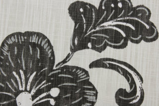 It features a bold floral vine pattern printed on a lightweight cotton duck, complete with a beautiful natural slub texture on a light cream background. This fabric is built to last with a durability rating of 65,000 double rubs for a lasting finish.  It can be used for several different statement projects including window accents (drapery, curtains and swags), toss pillows, headboards, bed skirts, duvet covers and upholstery. 