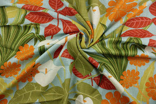 Robert Allen© Rowlily in Palm Beach is the perfect multi-purpose fabric.  Crafted from a linen blend, the fabric features a bright and colorful floral motif in shades of blue, green, orange, red, and eggshell.  This durable material is rated for 30,000 double rubs and is soil and stain resistant.  Perfect for window treatments (draperies, valances, curtains, and swags), upholstery, bed skirts, duvet covers, pillow shams and accent pillows.  